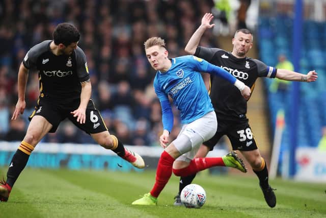 Ronan Curtis runs with the ball against Bradford