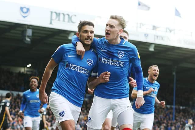 Gareth Evans celebrates his opener with Ronan Curtis
