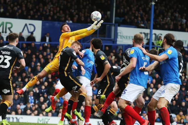 Bradford goalkeeper Richard O'Donnell attempts to claim a cross