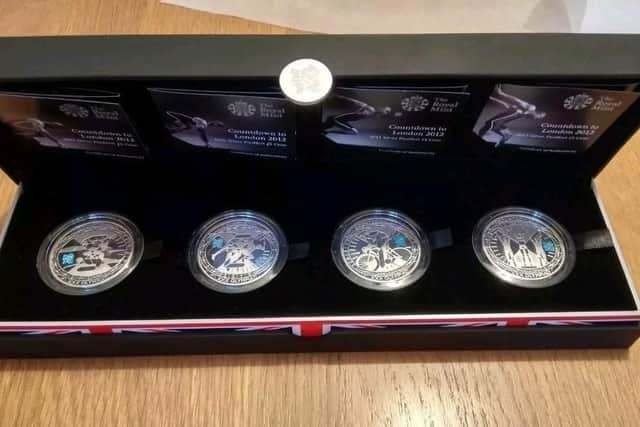 Coins stolen in aggravated burglary in Waterlooville.