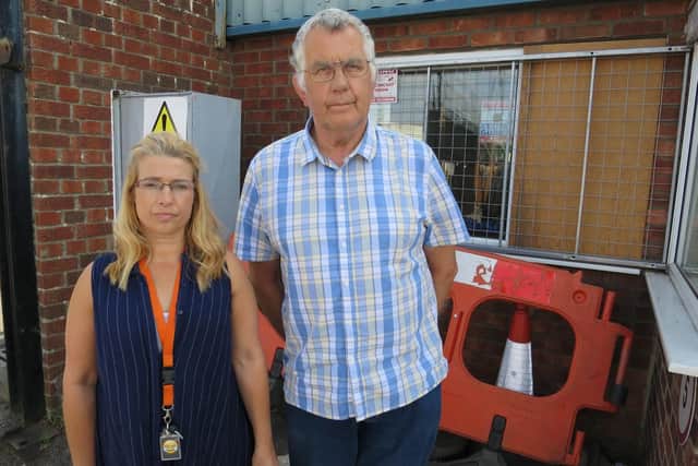Lorraine and Stuart Pottinger outside Jacob's Well Care Centre in Toronto Place in Gosport