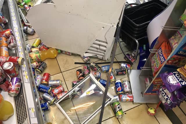 Inside the store after a car crashed into the Premier shop in Highlands Road Fareham