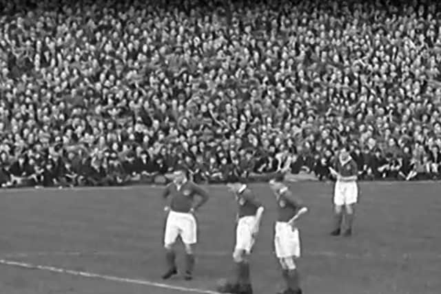 The Pompey forward line prepares to kick off. Many thousands on the north terracing on that record-breaking day. Picture: Tim King collection.