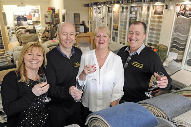 Staff at Carpet Fayre in Gosport celebrate 30 years in business with Gosport MP, Caroline Dinenage
(l to r), Toni Lewis, Dave King, senior staff member Beverley Bell and Toni's husband, Alun Lewis.
Picture: Ian Hargreaves  (020319-1)