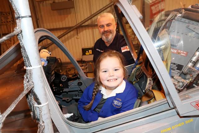 Pictured foreground to back Isla and PO Winrow. Children from Grange Infant School were given an extra special treat recently as they visited HMS Sultan.