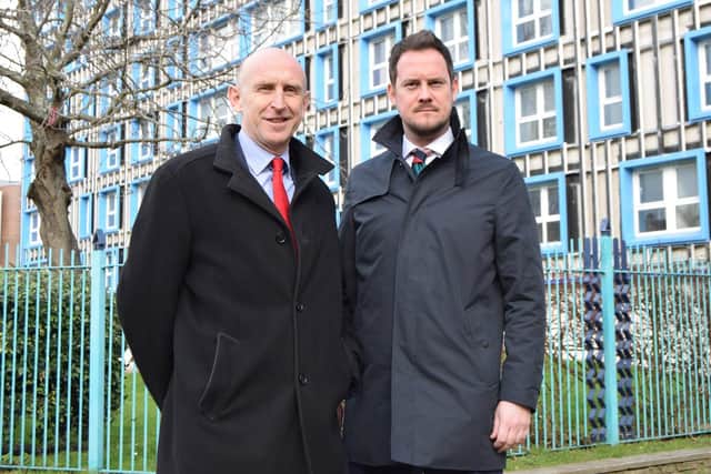 Shadow housing minister John Healey,, left, with Portsmouth South MP, Stephen Morgan, during a trip to Leamington House. The housing minister was touring the city to find out more about problem Portsmouth was having with it's social housing waiting lists. Photo: Tom Cotterill