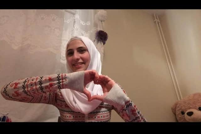 A still image of Doaa Al Zamel, who now lives in Sweden, taken from her Facetime call with the dance group. Picture: South Coast Collabo