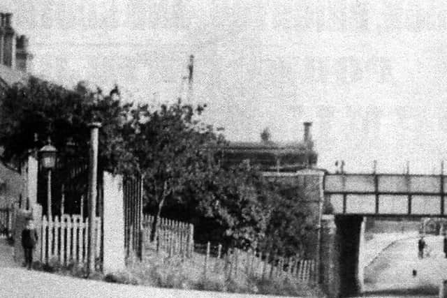 On North Street, looking towards Horndean Road under the railway bridge, Emsworth Station is on the left.