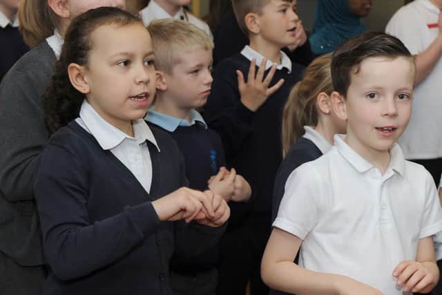 Pupils singing and using Makaton at the same time in front of other pupils visitors
Picture: Habibur Rahman