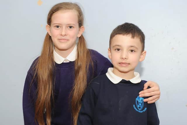 Head girl, Ella-May Muscat, 11, and Kaydyn Walker, five, who uses Makaton to help him with his speech.
Picture: Habibur Rahman