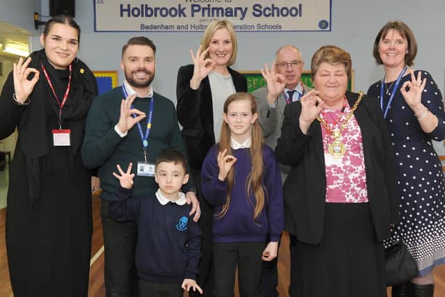 Makaton tutor Hannah Anderson, Steve Moloney, Kayden Walker, five, Ella-May Muscatt, 11, MP Caroline Dinenage, Raymond Furlong, Mayor Cllr Diane Furlong and head teacher Zoe Dudley
Picture: Habibur Rahman