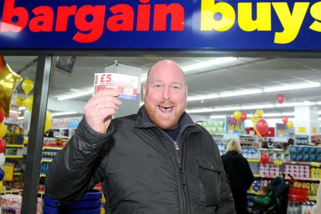 Ben Robinson, from Havant, who won a 5 off voucher at the opening of Bargain Buys in the Meridian Centre. Picture: Sarah Standing (080319-1369)