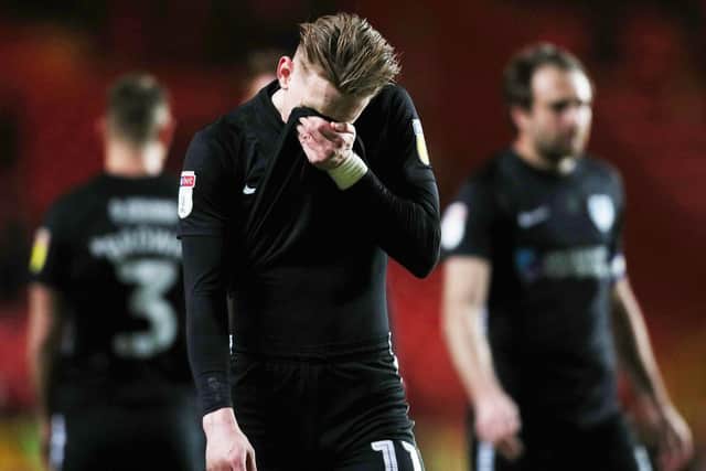 Ronan Curtis has head in hands after Pompey's defeat at Charlton. Picture: Joe Pepler