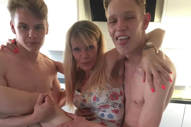 Happier times: Aaron Bache, left, pictured with his mother, Julia Bache, 49, and younger brother Marc Bache, 16.