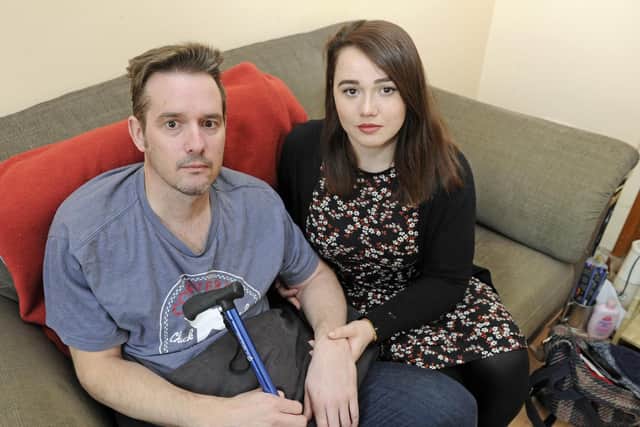Kimberley Jane Hakin with her dad Mark Hakin who has had his mobility scooter stolen from outside his home in Glasgow Road, Eastney. He has had a stroke and cannot get out without the scooter.
Picture Ian Hargreaves (100319-6)