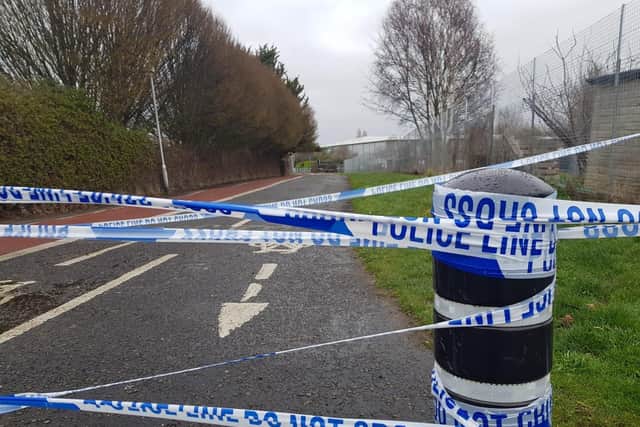 A police cordon is in place at Moneyfield Avenue in Portsmouth. Witnesses said officers arrived at around 5am. Picture: Habibur Rahman