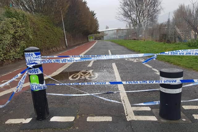 A police cordon is in place at Moneyfield Avenue in Portsmouth. Witnesses said officers arrived at around 5am. Picture: Habibur Rahman