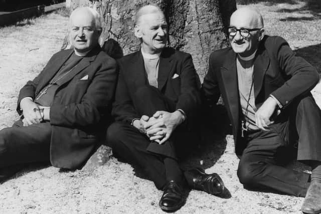 Three British Bishops relaxing after attending their last General Synod as they retire; (L-R) Bishop Edward Henderson of Bath and Wells, Bishop Oliver Tomkins of Bristol and Bishop John Phillips of Portsmouth, in the grounds of Church House in Westminster, London, July 2nd 1975. (Photo by Keystone/Hulton Archive/Getty Images)