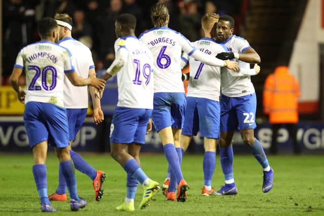 Omar Bogle celebrates after scoring Pompey's second goal