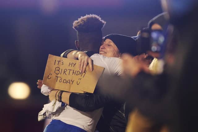 One Pompey fan gets a hug from Jamal Lowe as well as seeing the Blues win on the road to mark her big day