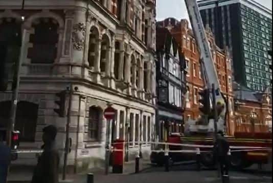 Still from a video showing firefighters at the scene in Portsmouth today