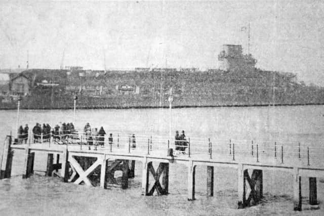 The  aircraft carrier HMS Courageous entering Portsmouth Harbour sometime in 1939 perhaps for the last time.