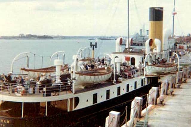 Seen alongside Portsmouth Harbour landing stage we see the paddle steamer Whippinghams lifeboats.