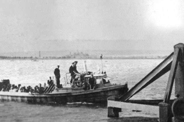 The Portsmouth to Hayling ferry arrives at Hayling. Undated image.