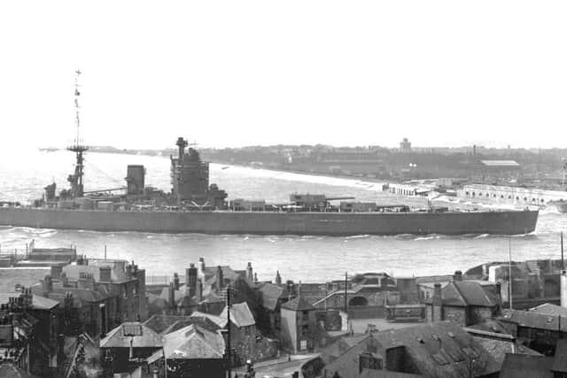 pre-1936 HMS Nelson and HMS Queen Elizabeth entering Portsmouth Harbour.