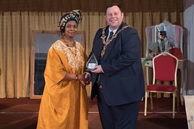 Outstanding Contribution Award winner Marie Costa receiving her prize from Lord Mayor Lee Mason.