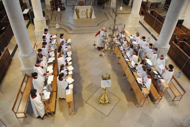 Musical director David Price and the cathedral choir practising for Evensong. Picture: Habibur Rahman