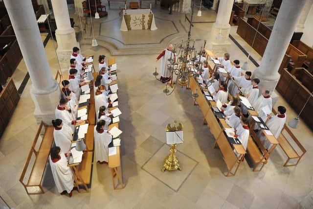 Musical director David Price  and the cathedral choir practising for Evensong. Picture: Habibur Rahman