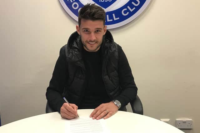 Gareth Evans signs a new Pompey deal. Picture: Portsmouth FC