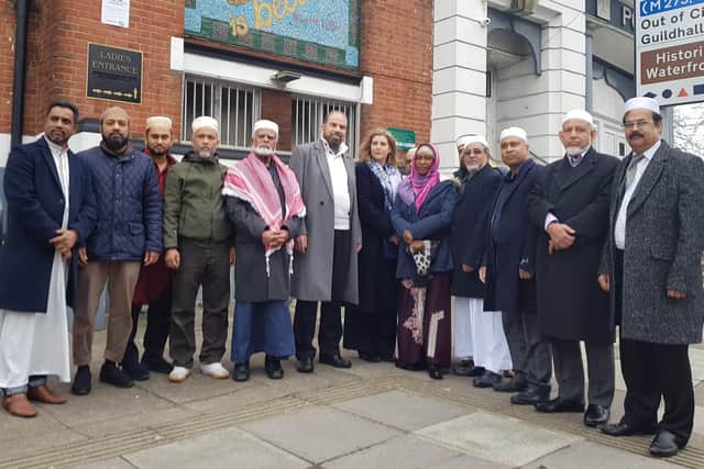 Muslim gather with Portsmouth North MP Penny Mordaunt outside the city's Jamie Mosque. Photo: Habibur Rahman
