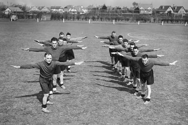 22nd March 1939:  The players of Portsmouth Football Club train for their forthcoming F A Cup Semi-Final at a training ground in Bognor, Sussex,  (Photo by H. F. Davis/Topical Press Agency/Getty Images)