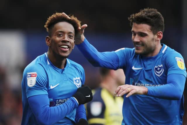 Jamal Lowe celebrates his goal with Gareth Evans