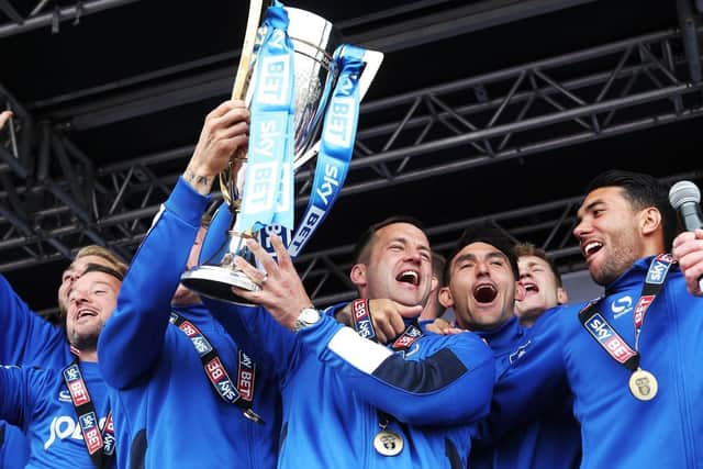 Pompey celebrate winning the League Two title. Picture: Joe Pepler