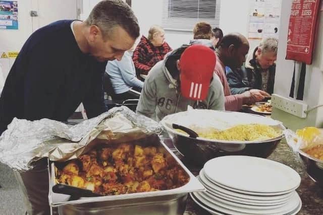 Sailors cooked up a curry for about 50 people.