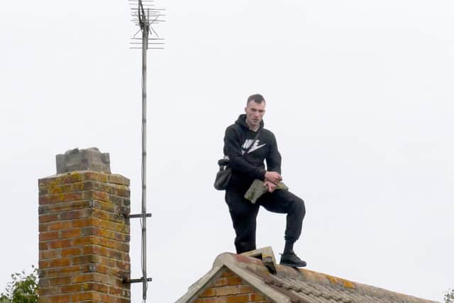 Liam Warrener pictured in the rooftop standoff in October last year near Asda in Portsmouth. Picture: Habibur Rahman