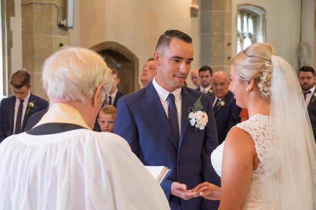 Darren and Jade exchange vows at Westbourne Church. Picture: Carla Mortimer Photography