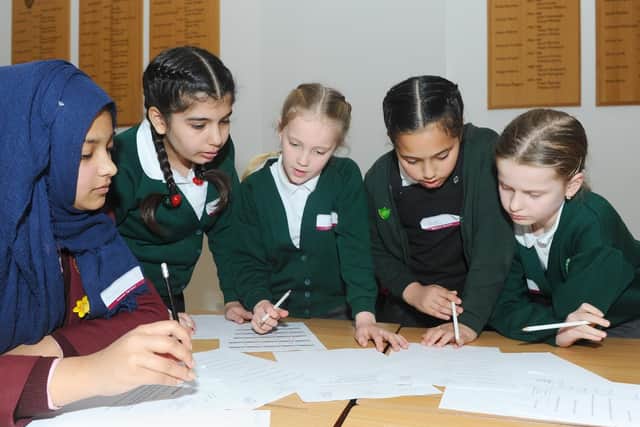 From left, Anisa Rahman, 15, from Portsmouth High School with Shaiy Karadakh, 11, Jessica Evans, nine, Rim Abounasr, 10, and Linda Szalontai, nine, from Fernhurst Junior School.
Picture: Sarah Standing (190319-2431)