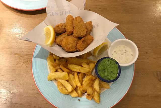 The wholetail scampi, chips and mushy peas - served with tartare sauce and lemon