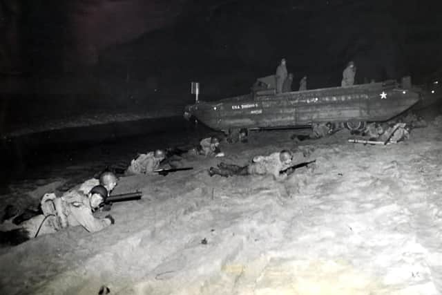 American soldiers and sailors in the British Isles are conducting manoeuvers in various parts of Britain, practising land operations, invasion tactics and attack problems.  The exercises  are full dress rehearsals for the finale of the European war.  Here troops fall onto the beach prepared for any eventualities.
Historic D-Day photographs from numerous sources American and British.