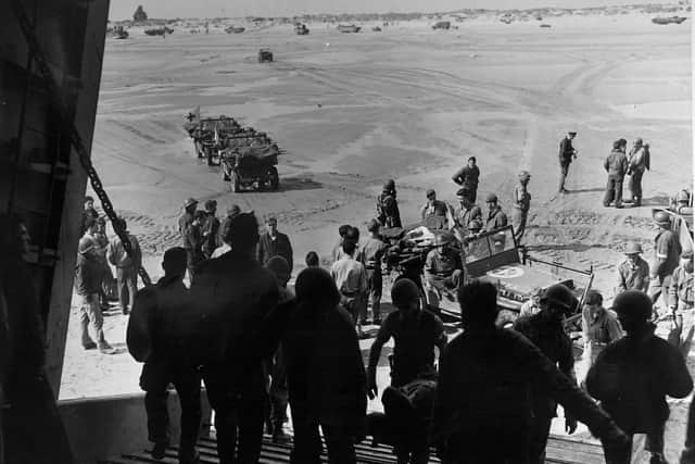 OFFICIAL U.S. COAST GUARD PHOTO. GERMAN PRISONERS ABOARD A COAST GUARD-MANNED TRANSPORT.