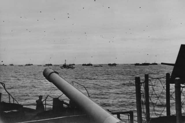 Photograph taken from HMS Frobisher showing landing craft approaching Arromanches (Gold Beach) on DDay.