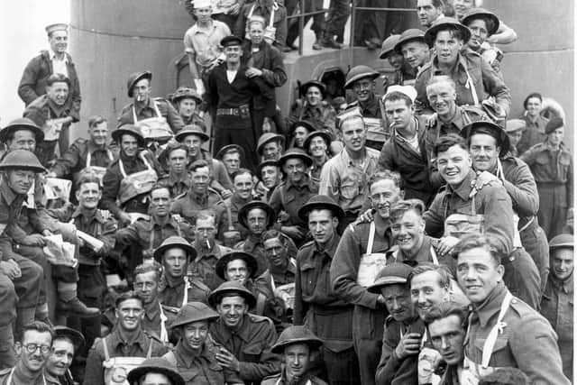 Troops prepare to board ship