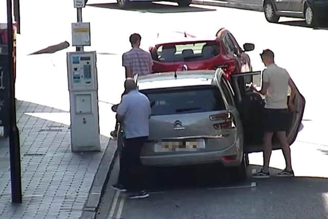 CCTV images show the Ager family arriving in King Henry I Street in Portsmouth city centre as they used two counterfeit disabled badges to avoid having to pay 12 per car. Ben Ager his father Terry Ager and his mother Deborah Ager all appeared in court along with his aunt Joanne Tucker. Picture: Portsmouth City Council
