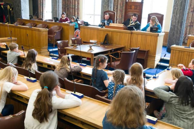 Children's group Dream Catchers hold their very own children's parliament at the Guildhall, Portsmouth. Picture: Duncan Shepherd