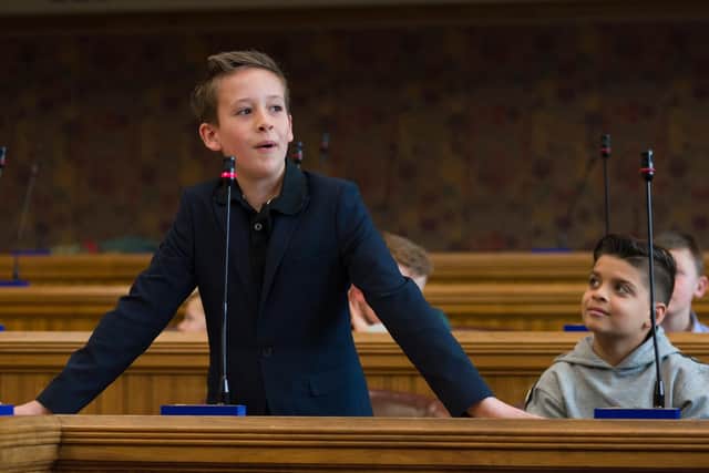 Children's group Dream Catchers hold their very own children's parliament at the Guildhall, Portsmouth. Picture: Duncan Shepherd
