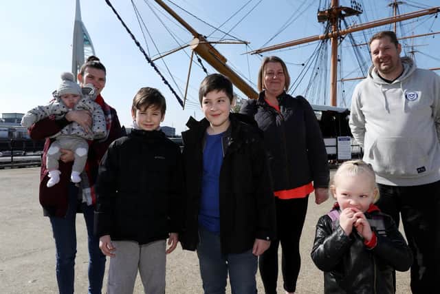 From left, Lindy Morrow with Elodie-Rose, 3 months, Lenton, 9, Jay, 10, Pamela Cowlishaw, Josie-Rose, 3, and Andy Miles at the taster day at Portsmouth Historic Dockyard, where some  visitors were guests of The News'. Picture: Chris Moorhouse (240319-5)